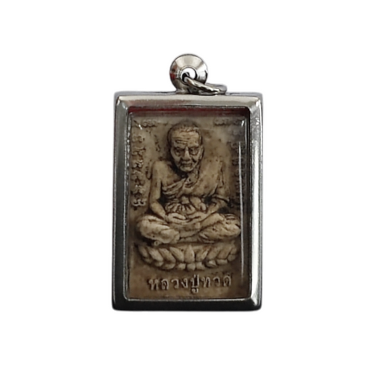 LP Thuad amulet displayed with cultural reverence and spiritual meaning