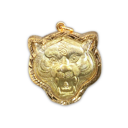 Vintage-style Thai amulet with symbolic markings for protection and good fortune